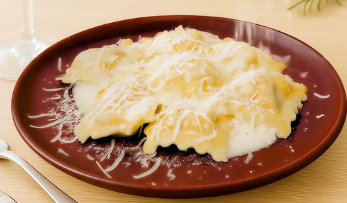 Raviolones de Calabaza con crema y parmesano