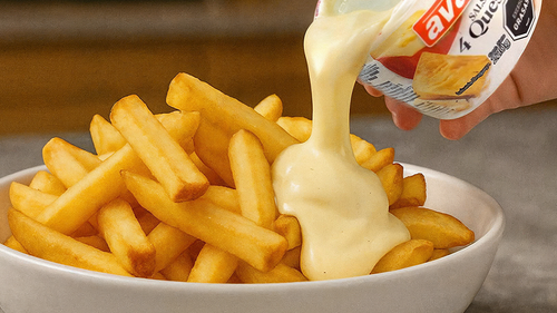 Papas fritas con Salsa 4 Quesos