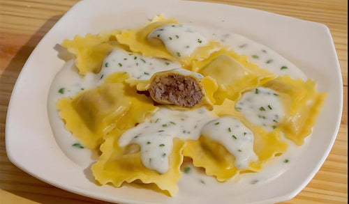 Raviolones de Hongos con salsa de crema y ciboulette